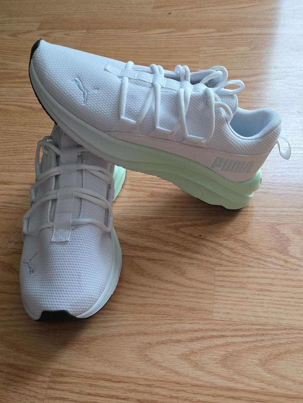Puma
Women’s Softride One4All Mesh Fade Sneakers